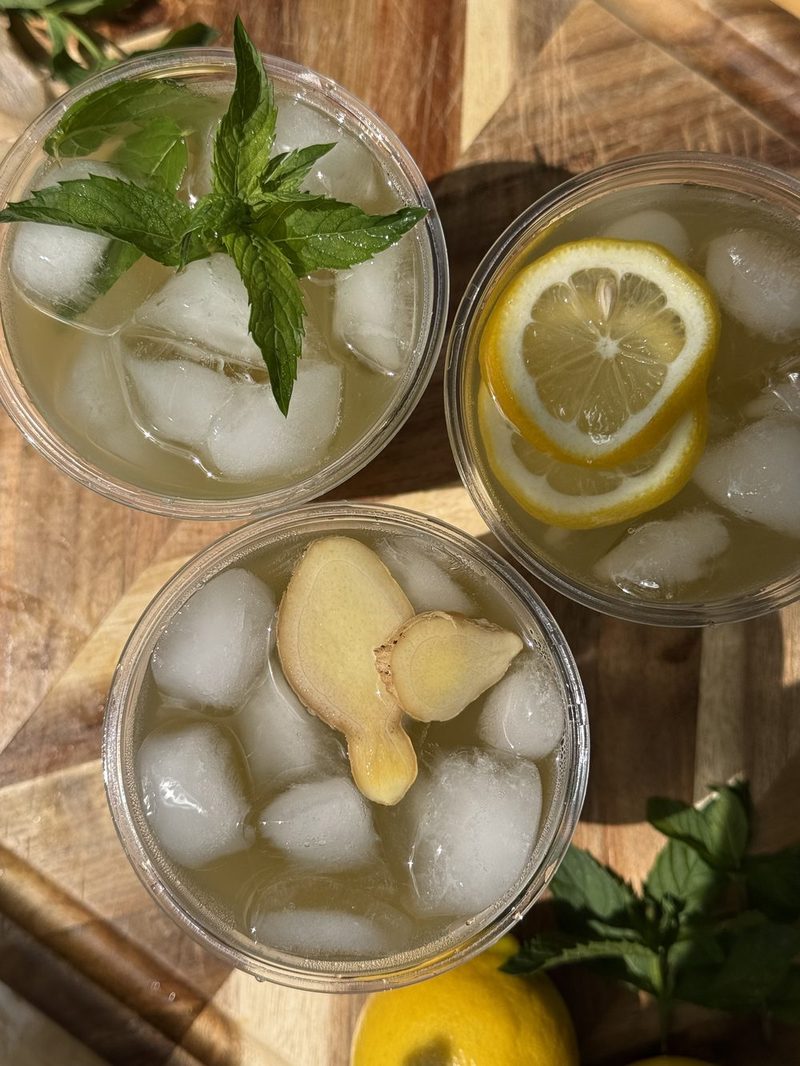 Three cups of iced sugarcane juice